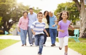 childs playing with family