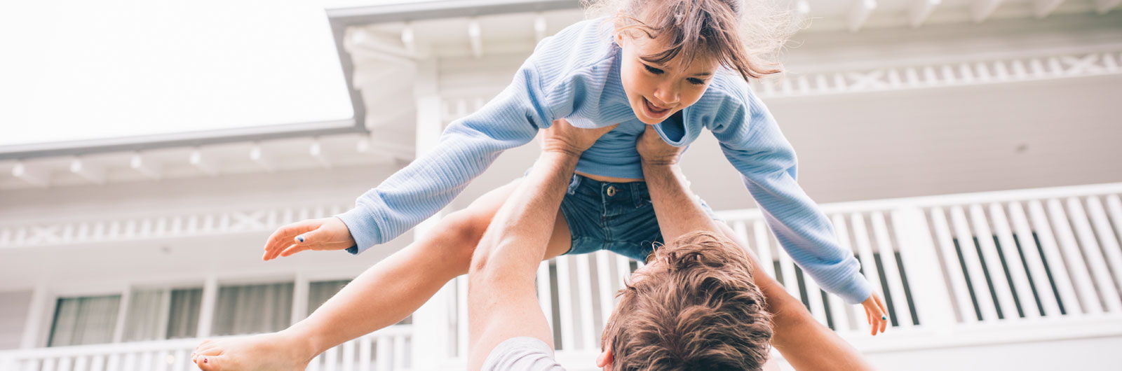 father is playing with his daughter
