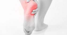 Person with Heel Pain Shown By Red Heat Atlanta GA 